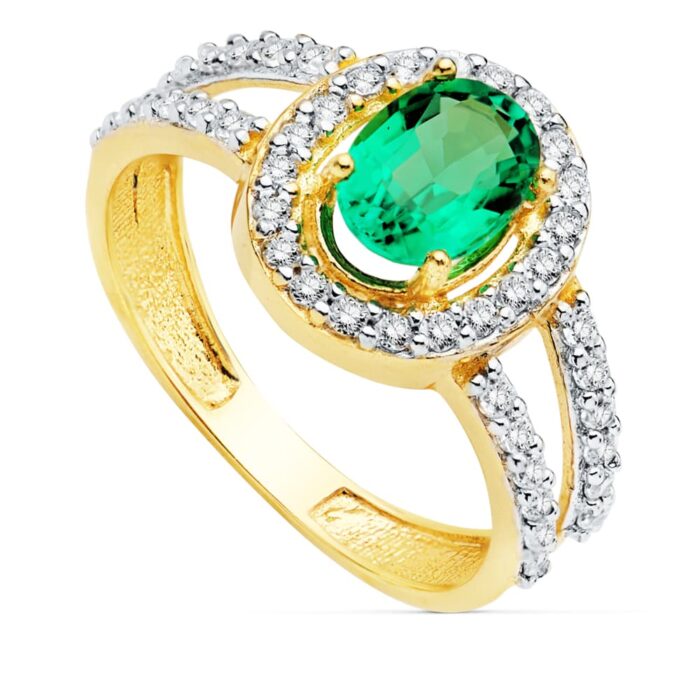 18K SORTIJA ESMERALDA 0.79 QT.7X5 MM CIRCONITAS