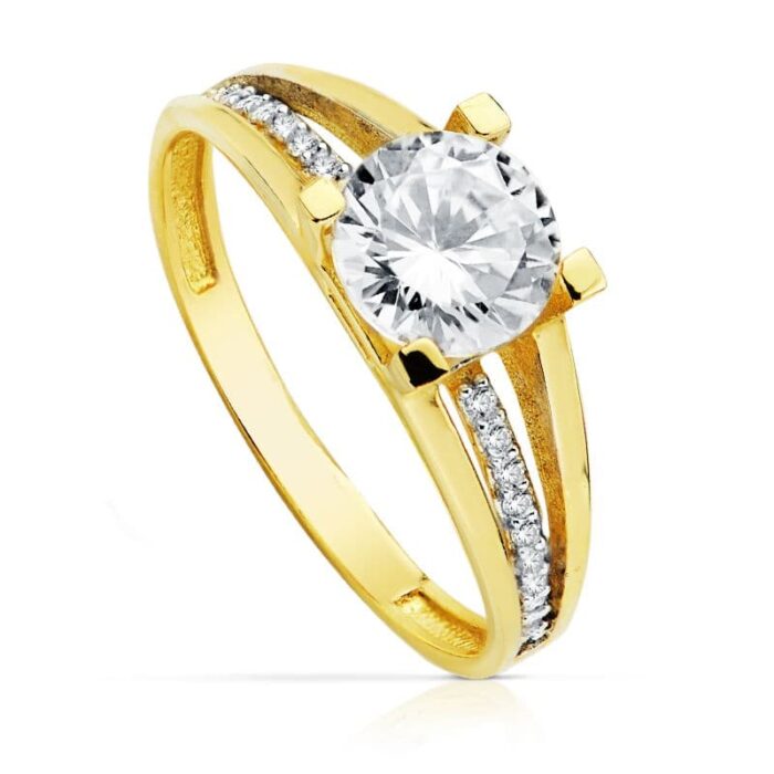 18K SOLITARIO ORO BICOLOR CIRCONITAS CON 4 GARRAS Y CIRCONITA DE 7 MM