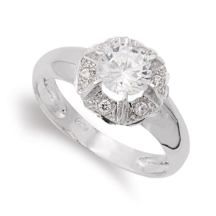18K SORTIJA ORO BLANCO CON CIRCONITA Y GARRAS. ANCHO: 11 MM