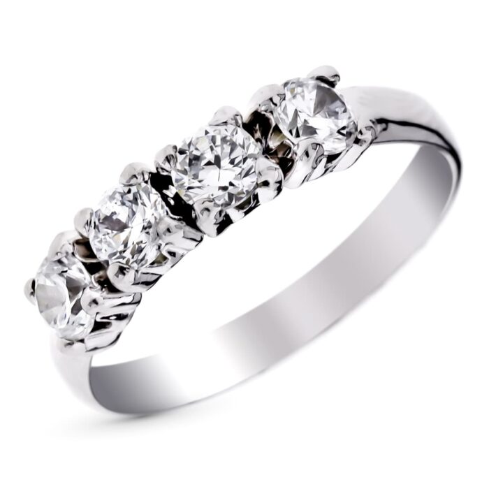 9k SORTIJA ORO BLANCO CON CIRCONITAS EN GARRAS. ANCHO: 4 MM
