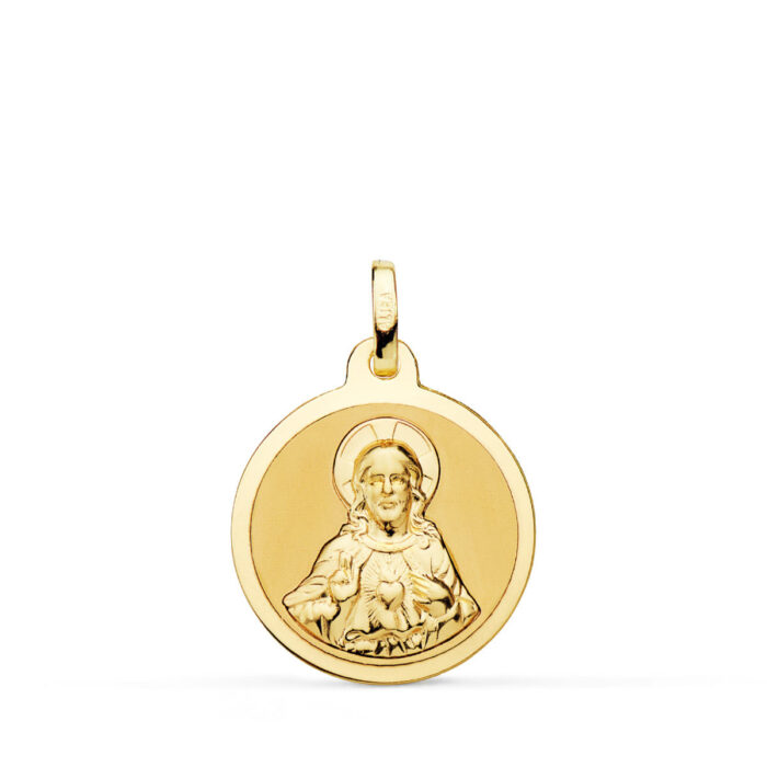 Medalla redonda de oro amarillo de 18k del Sagrado Corazón de Jesús de 18 mm con relieve central matizado y orla perimetral tallada en brillo sobre fondo blanco