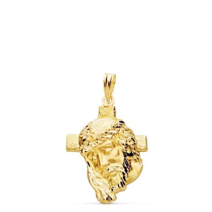 Colgante de oro amarillo de 18 quilates con la Cabeza de Cristo sobre una cruz, peso 2.40 gramos y tamaño 26x18 mm.