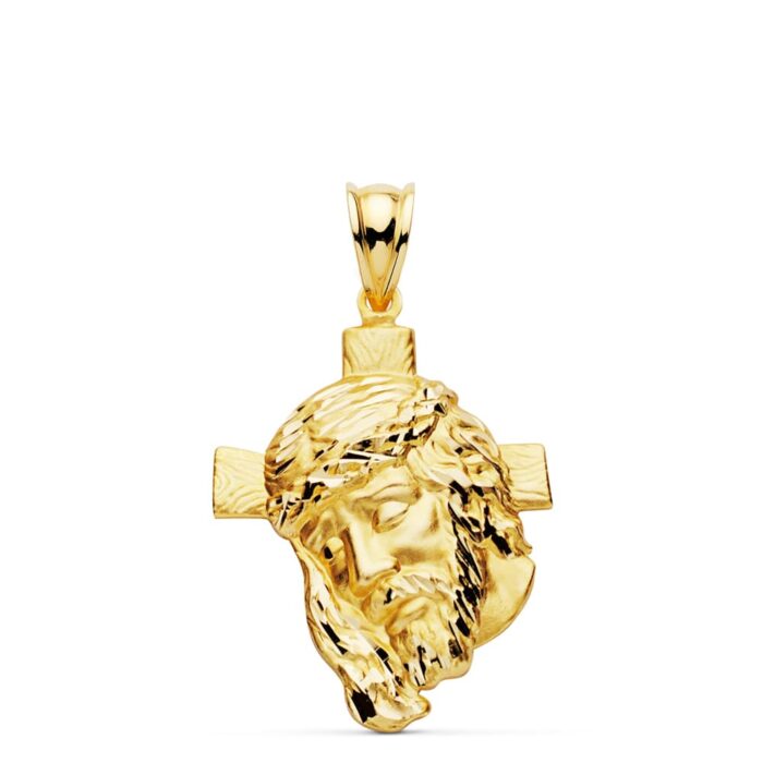 Colgante de oro amarillo de 18 quilates con el rostro de Cristo en relieve sobre una cruz, tamaño medio 31x21 mm.