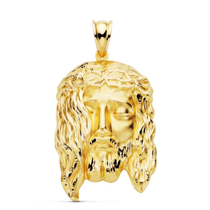 Colgante alargado de oro amarillo de 18 quilates con la imagen del Santo Rostro de Cristo en relieve, tamaño 35x20 mm.