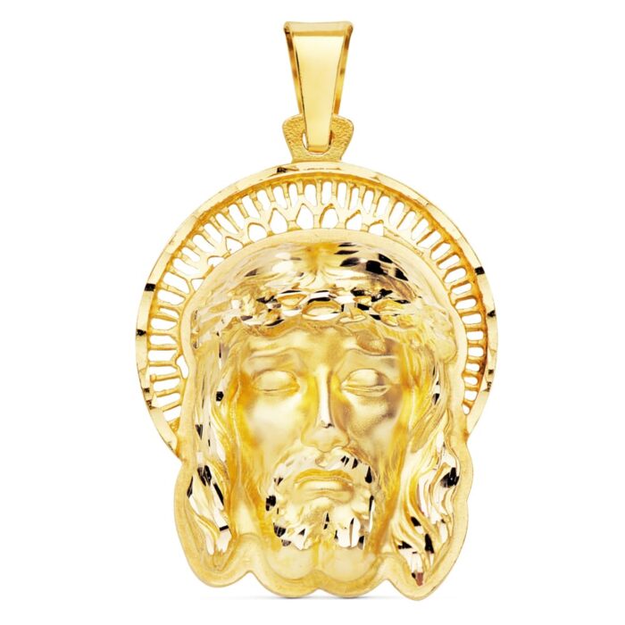 Colgante de la Cabeza de Cristo con potencias y orla calada ornamental en oro amarillo de 18 quilates, tamaño 35x25 mm.