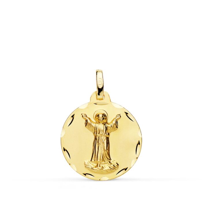 Medalla religiosa del Divino Niño Jesús en oro amarillo de 18 kilates, 18 mm de diámetro, con borde tallado brillante y relieve central.