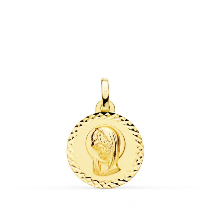 Medalla de la Virgen Niña de perfil en oro amarillo de 18 quilates con borde labrado en talla cruzada de 16 mm de diámetro.