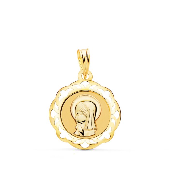 Medalla religiosa de la Virgen Niña de perfil en oro amarillo de 18 quilates con cerco calado ornamental y pulido brillante de 20x18 mm.